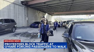 OHare Airport travelers walk to terminal as proPalestinian protesters block traffic [upl. by Orazal]