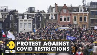 Thousands of people took to the streets of Amsterdam to protest against COVID restrictions  WION [upl. by Genie]