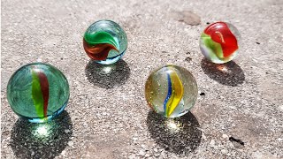 4 big Cat Eye marbles on the stands [upl. by Osgood]