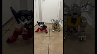 Optimus Prime amp Grimlock show off transformers optimusprime robot shorts workout cool funny [upl. by Ialokin]