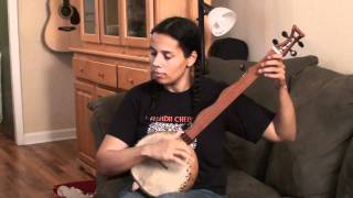 Rhiannon Giddens plays on her gourd banjo quotBriggs Corn Shuckin Jig quot and quotCamptown Hornpipe [upl. by Amaj]