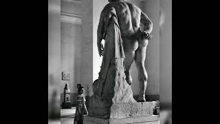 a woman looking up at the Farnese Hercules a Roman sculpture from the early third century AD [upl. by Eerot964]