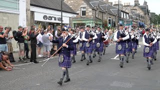 United Maniacs Pipes amp Drums from Switzerland playing on the march to 2023 Pitlochry Highland Games [upl. by Masha]