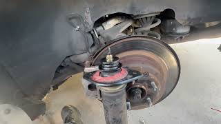 2005 INFINITI G35 REAR SHOCK REPLACE [upl. by Fitzpatrick]