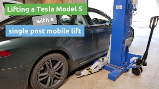 Lifting a Tesla Model S with a single post mobile lift or with a trolley jack [upl. by Anisah]