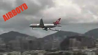 Swissair MD11 Crosswind Landing Kai Tak Airport 1998 [upl. by Eam]