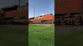 Spotted this BNSF trio with a noseless h2 leading a grain train leaving BNSF Casey yard [upl. by Aelaza]