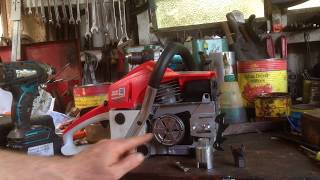 Removing the clutch from a 45cc Chinese chainsaw Baumr SX45 [upl. by Anyrak]