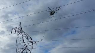 Helicopter pulling new electrical power line Vancouver wa [upl. by Enyleuqcaj]