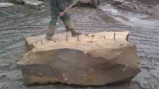 Drilling and breaking a yorkstone sandstone block [upl. by Sergo117]