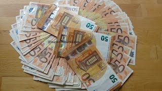 Counting a stack of 50 Euro banknotes [upl. by Hakan686]