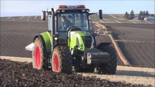 Claas Arion 640 tractor with Ovlac 5 furrow reversible plough  Grampian Supermatch [upl. by Sidky]