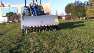 MultiOne Loader with Core Aerator Attachment [upl. by Ahsinar]