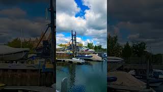 Lowering boat into the harbour Lymington New Forest boats coast hampshire uk [upl. by Omarr]