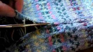 Cutting a steek in a Knitted Fair Isle baby blanket [upl. by Aipotu]