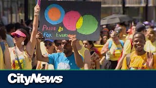 Pride parade takes over downtown Toronto [upl. by Akoyn]