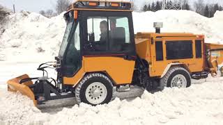 Trackless Articulating Sidewalk Tractor with 5Position Folding VPlow [upl. by Nealon]