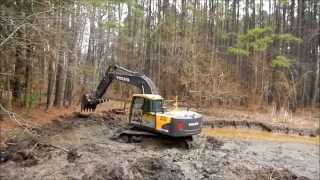 Volvo EC160CL Excavator Digging Mud [upl. by Upshaw]