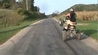 Mile Long Wheelie on 4 wheeler ATV 65 MPH [upl. by Aizirtap12]