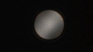 Nepheline interference figure obtained on a crystal oriented parallel to the C axis [upl. by Aryt]