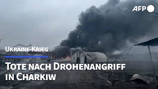 UkraineKrieg Tote bei Drohnenangriff auf Charkiw  AFP [upl. by Aliled991]