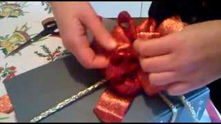 Come fare un fiocco regalo How to make a bow mp4 [upl. by Anomas]