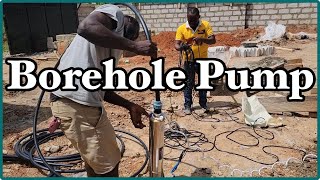 Submersible Borehole Pump Installation  Building A House In Ghana  Episode 39 [upl. by Chainey605]